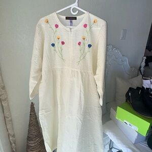 Elegant Cream Dress with Floral Embroidery